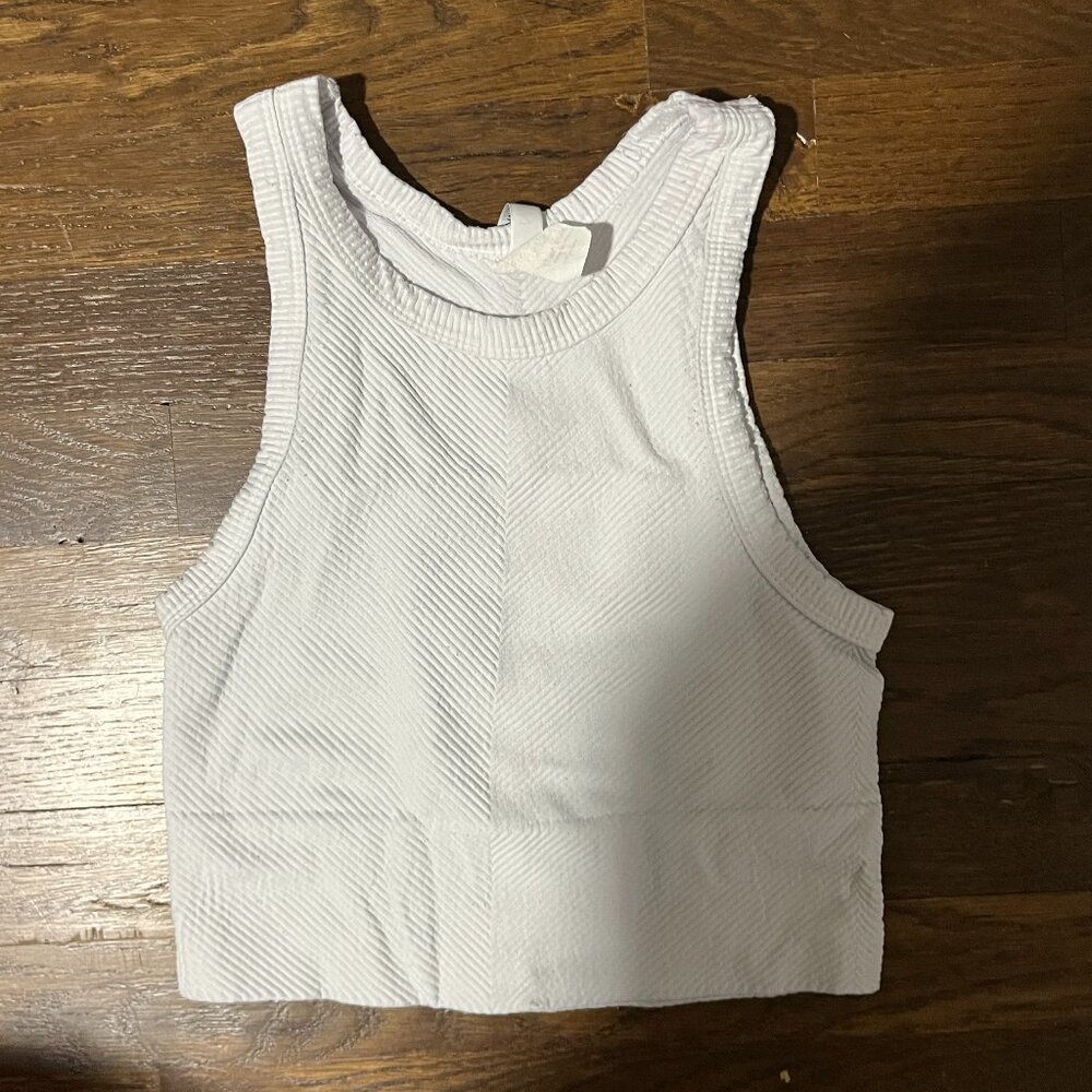 A NIKIBIKI white high neck tank top in the size S